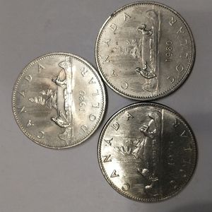 3 Canadian Silver Dollar coins